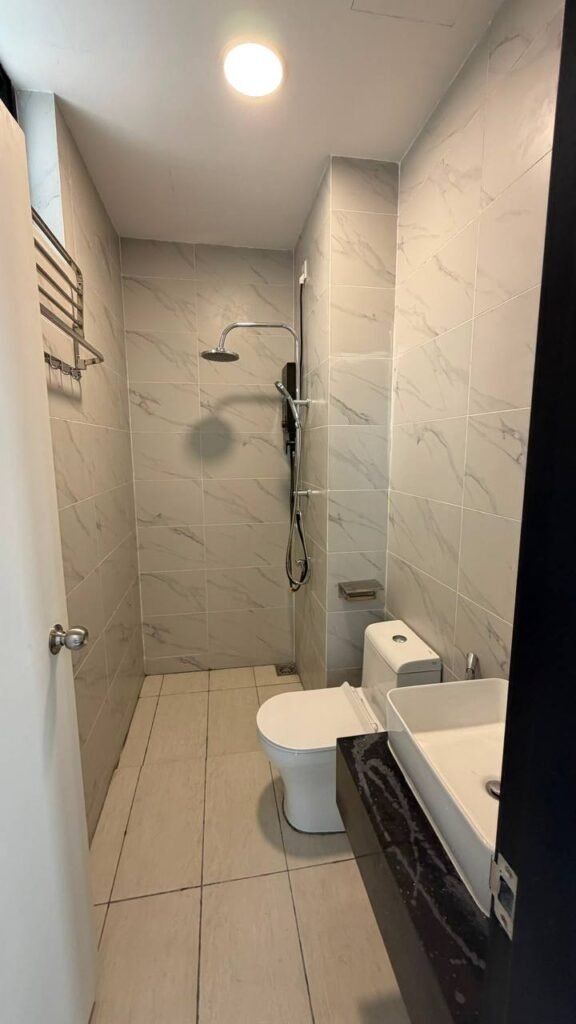 Bathroom with shower, toilet and basin