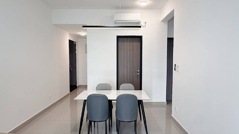 Dining area with table, chairs and wall-mounted air conditioner.