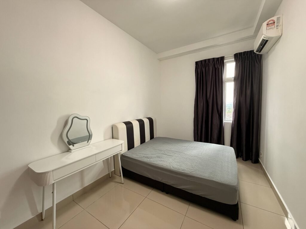 A compact bedroom with a bed, side table, curtains, and wall-mounted air conditioner.