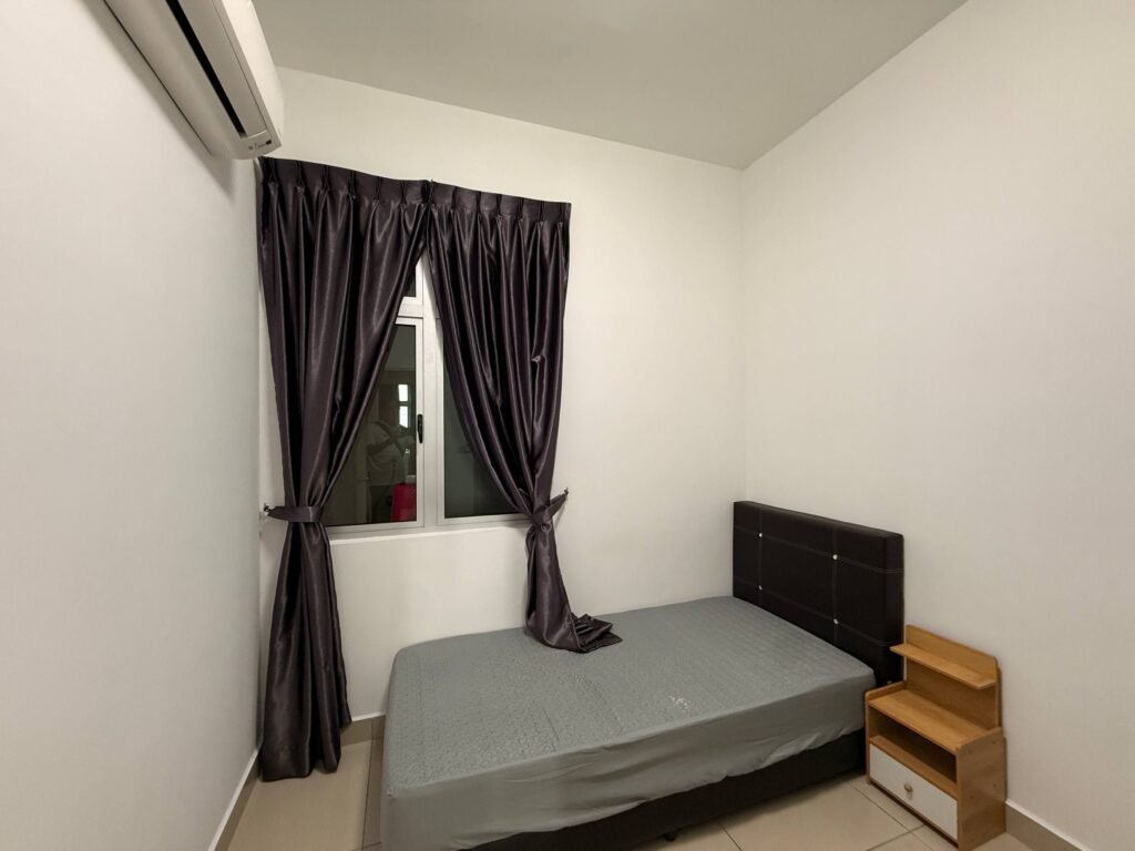 A second compact bedroom with a bed, small shelf, curtains, and wall-mounted air conditioner.