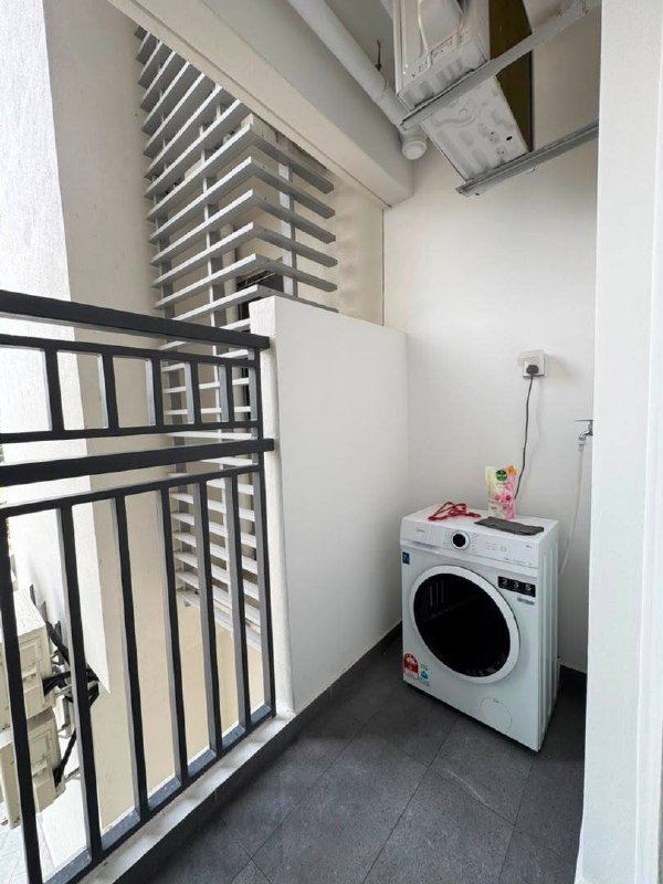 Service balcony with washing machine and outdoor utility space.