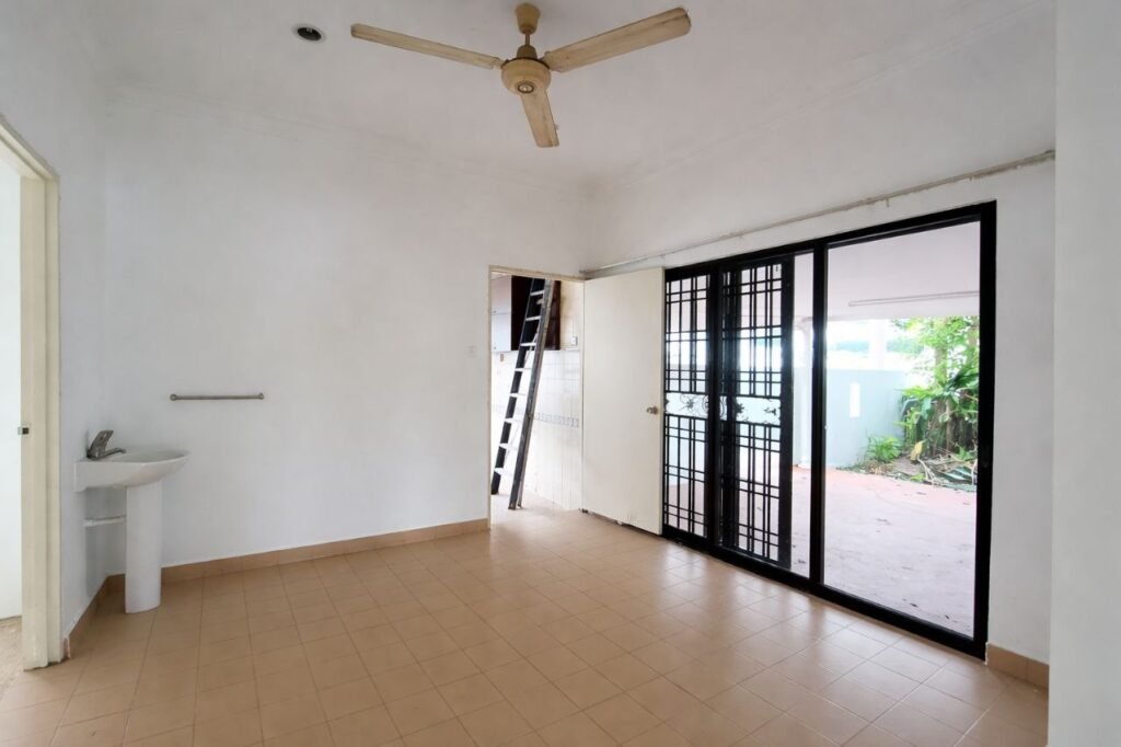 Empty room with ceiling fan, tiled floor, and sliding glass door