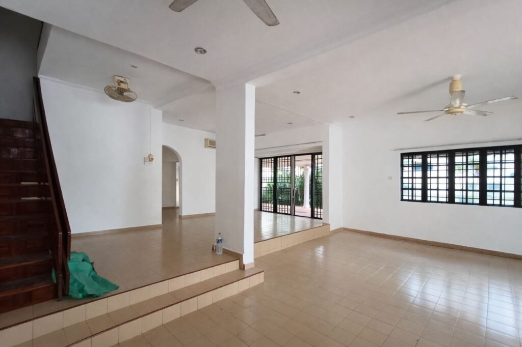 Spacious interior living area with staircase and tiled flooring