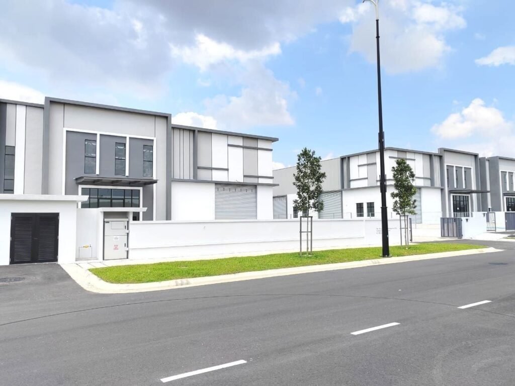 Exterior view of a modern industrial factory building and driveway
