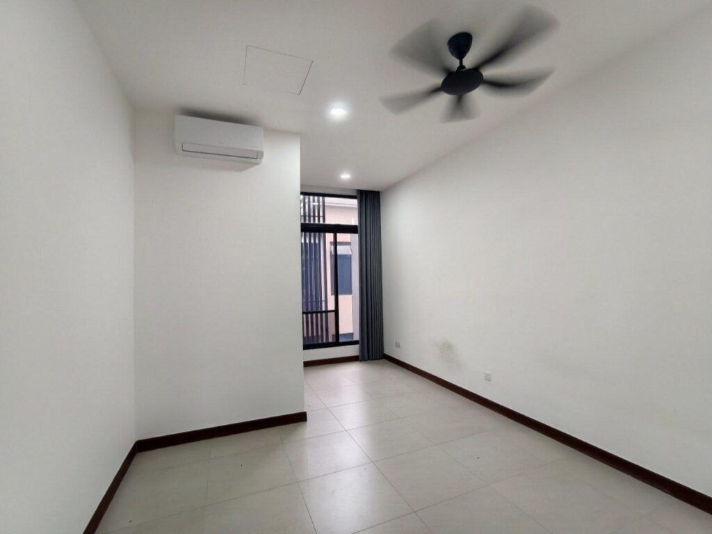 Compact bedroom with air-conditioner and a window to the exterior.