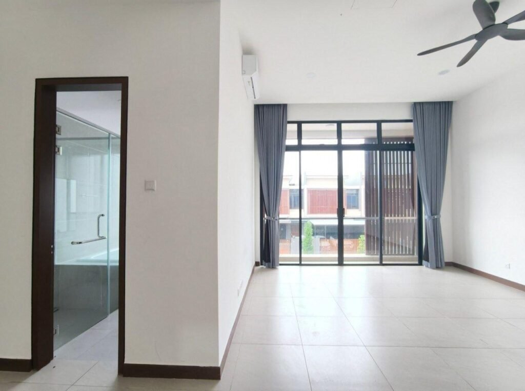 Front living area with large sliding doors and natural light.