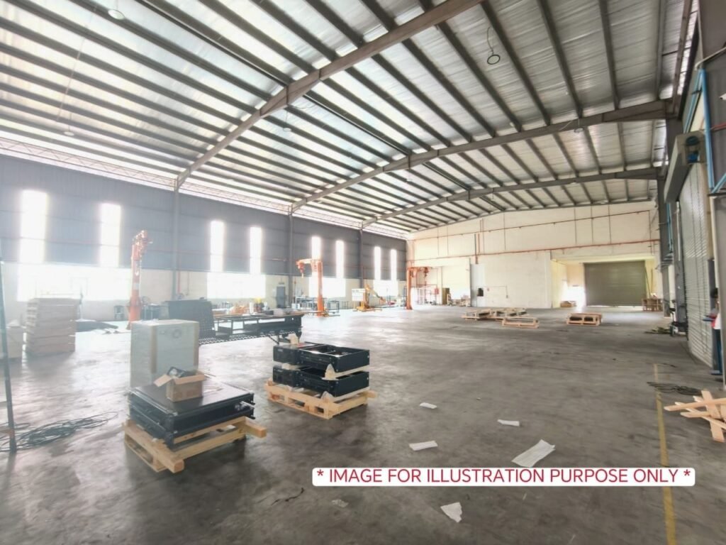 Industrial interior with open floor space and stored materials